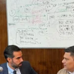 César Onzari junto a Miguel Molina, uno de sus defensores